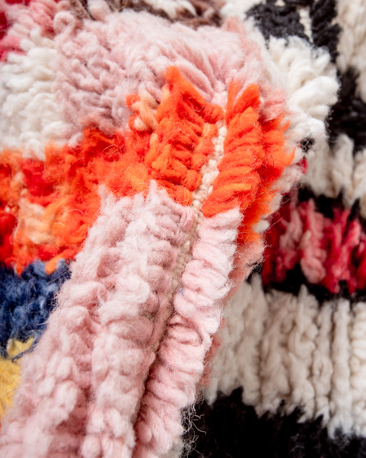 Modern, designer, handcrafted Berber rug from Morocco. Beniourain carpet with beautiful colours and patterns and fluffy wool texture.